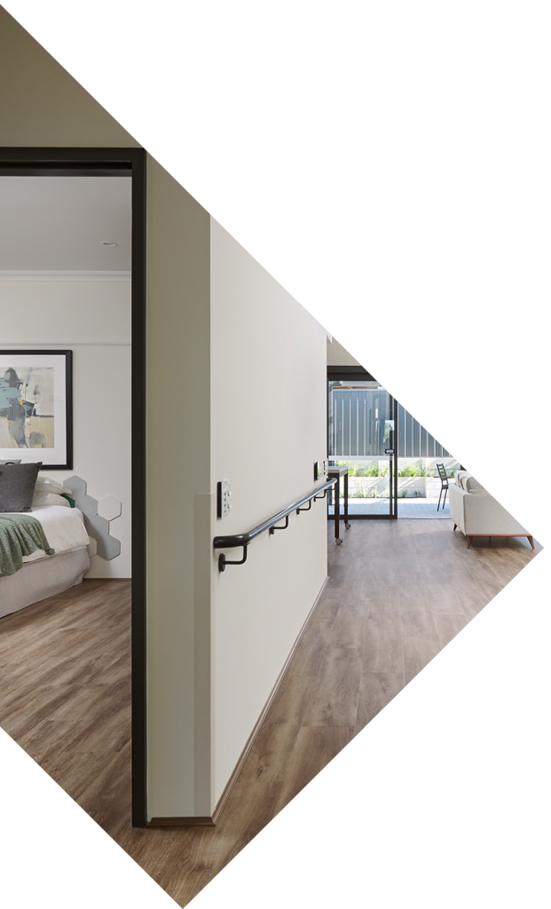 about you - disability accomodation in perth metro area What the inside of a Shift home looks like. A long hallway with railing extends to the back yard.